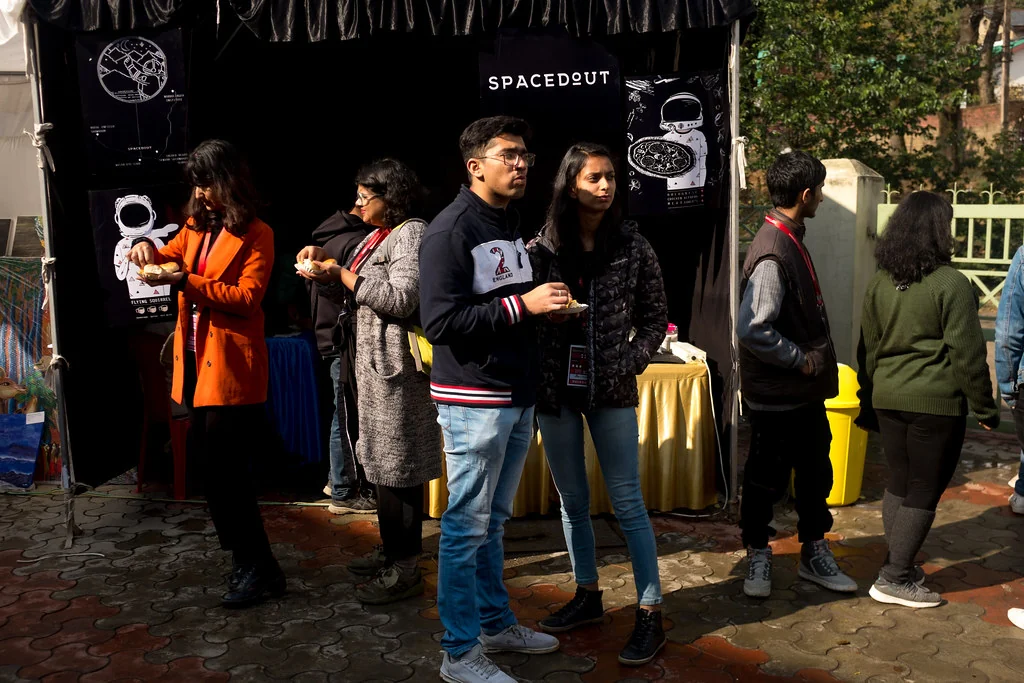 People sharing a conversation at TEDxDharamshala