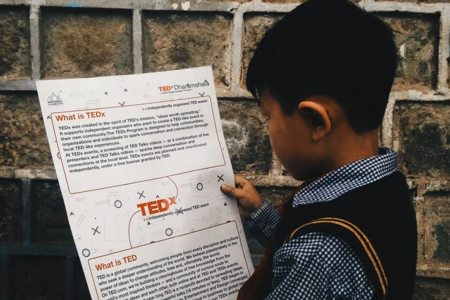 A young reader discovering TEDxDharamshala